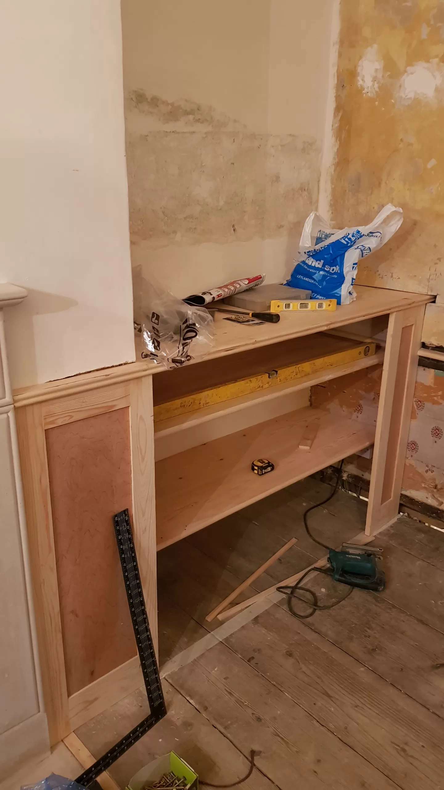 Construction of new alcove cupboard.