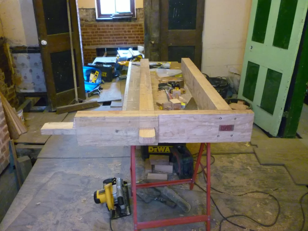 Joists on bench showing through tenons.